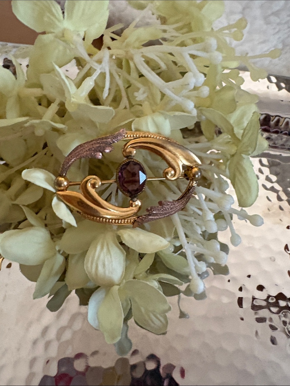 Vintage-Inspired Gold Brooch with Purple Stone